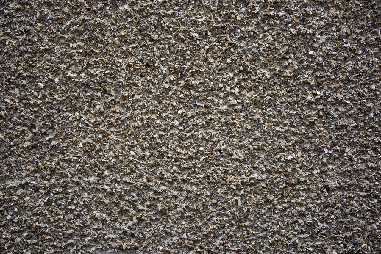 Granit czy beton? Porównanie materiałów do układania bruku