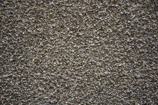 Granit czy beton? Porównanie materiałów do układania bruku